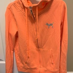 Pink full zip up sweatshirt